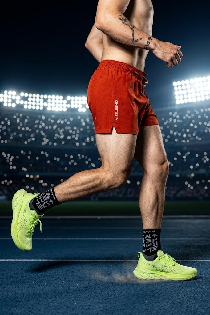 SHORT ROJO TERRACOTA DE COMPETENCIA PARA HOMBRE KINESTESIA