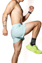 SHORT AZUL AQUA DE COMPETENCIA PARA HOMBRE KINESTESIA