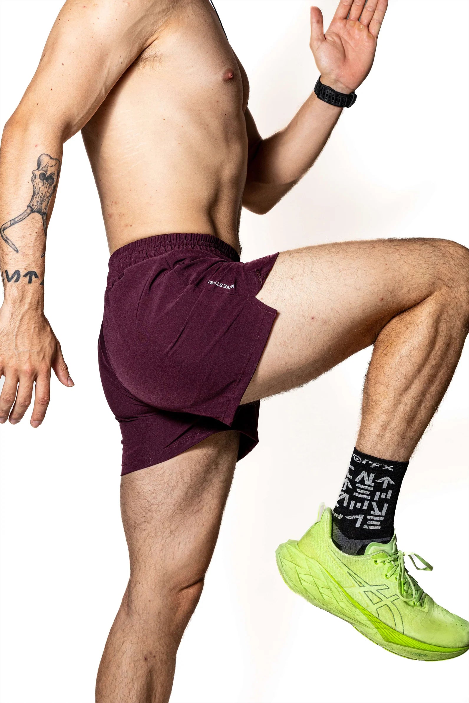 SHORT PURPURA DE COMPETENCIA PARA HOMBRE KINESTESIA