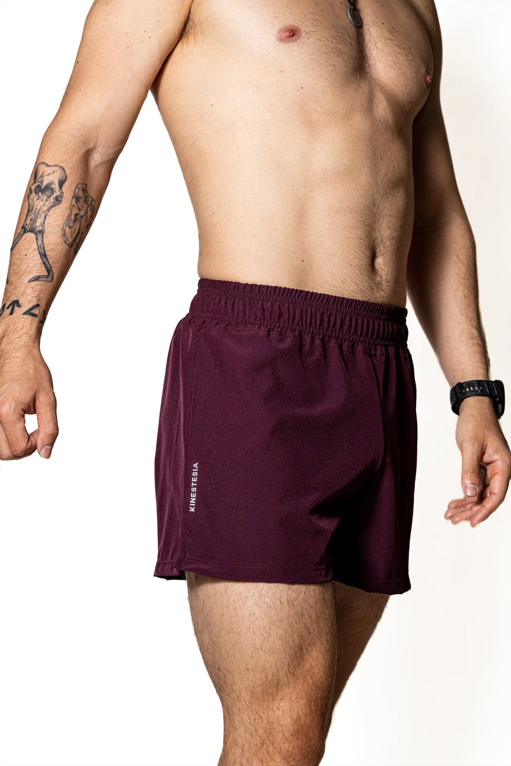 SHORT PURPURA DE COMPETENCIA PARA HOMBRE KINESTESIA