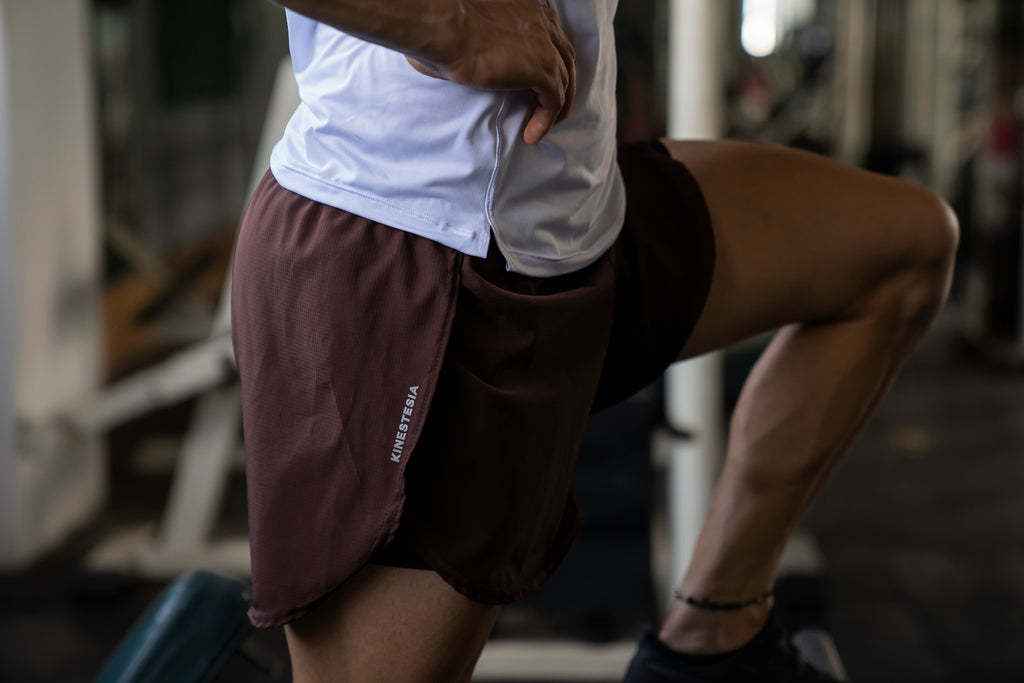 RUNNING SHORT unisex MARRÓN KINESTESIA