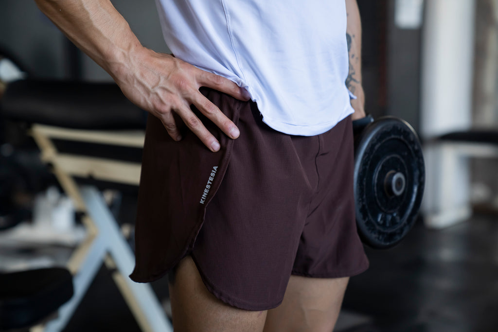 RUNNING SHORT unisex MARRÓN KINESTESIA
