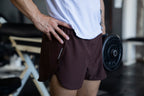 RUNNING SHORT unisex MARRÓN KINESTESIA